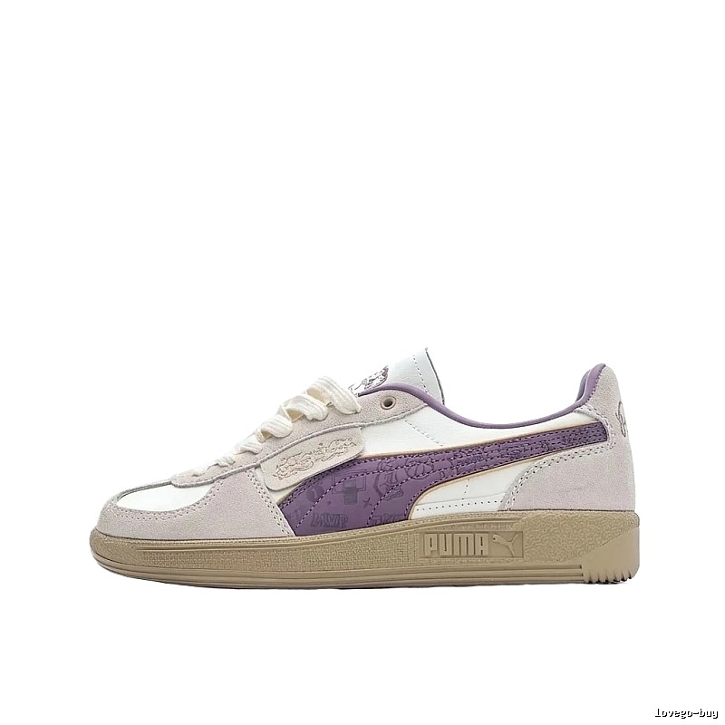 PUMA retro-style purple and white sports shoes